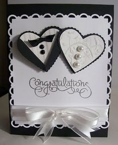 cute black and white bride and groom hearts w white satin ribbon