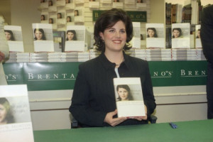 Former White House intern Monica Lewinsky displays a copy of her book ...