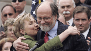 Hillary Clinton hugs her old friend Jon Corzine AP