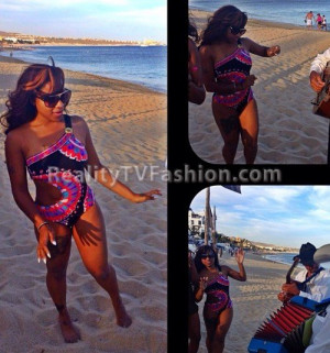 Toya Wright’s Cabo Vacation Orange & Purple Asymmetrical Stripe Maxi ...