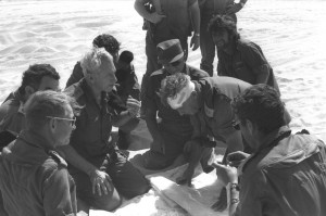 ... Sharon (with bandage) and Moshe Dayan (cap) during the Yom Kippur War