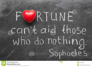 ... quote about fortune and those who do nothing handwritten on blackboard