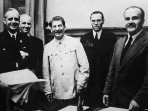 Minister Joachim Von Ribbentrop (left), Soviet leader Joseph Stalin ...