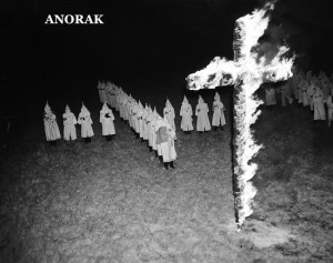 Members of the Ku Klux Klan, wearing traditional white hoods and robes ...