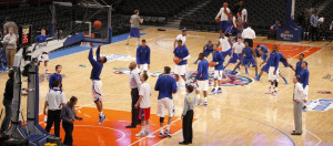 The Jayhawks warm up prior to tipping off against Memphis during the ...