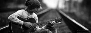 black and white fb covers alone boy with guitar