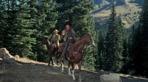 John Wayne (Marshall Reuben J. 'Rooster' Cogburn) and Glen Campbell ...