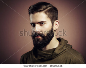 Portrait of handsome man with beard. Close-up - stock photo