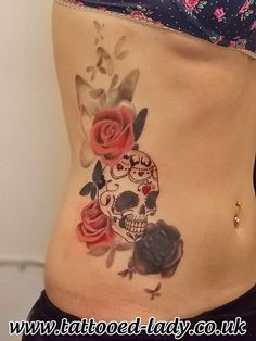 ... of a rose with monarch butterfly petals, a sugar skull and henna lace