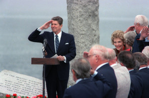 PresidentRonald Reagan salutes during a ceremony commemorating the ...