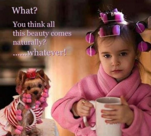 Funny girl and dog with curlers