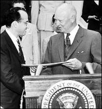 Dr. Jonas Salk receiving a Gold Medal from President Eisenhower ...