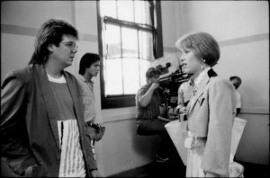 John Hughes with Molly Ringwald behind the scenes of Pretty in Pink