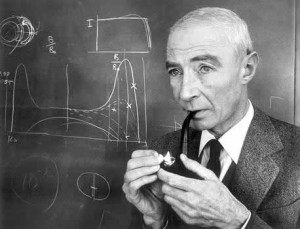 Robert Oppenheimer - Atomic scientist lights his pipe in front of a ...