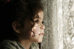 Child Advocacy & Assessment Program: child looking out of window