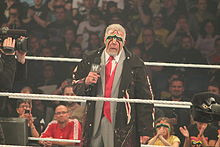 The Ultimate Warrior in his last appearance on Raw , in a mask ...