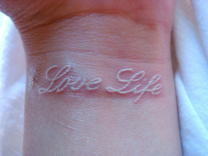 White-ink-tattoos-on-wrist-Love-life-wrist-tattoo-Simple-and-beautiful ...