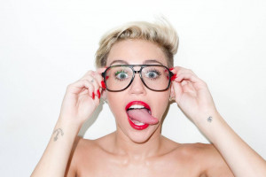 Miley in glasses sticking tongue out - Miley Cyrus Picture