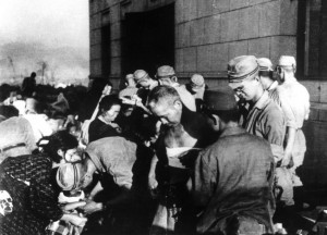 Hiroshima atomic bombing survivors receive emergency treatment by ...