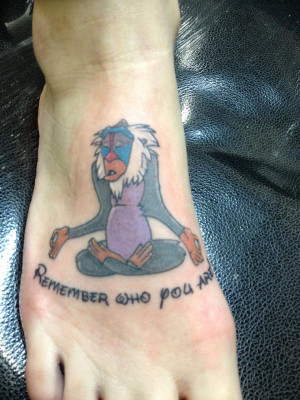 Ashleigh's Rafiki with Quote. Tattoo by Justin