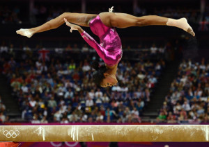 Gabrielle Douglas of the U.S. competes in the balance beam during the ...