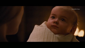 Baby Renesmee looks into Jacob's eyes, causing him to imprint on her.