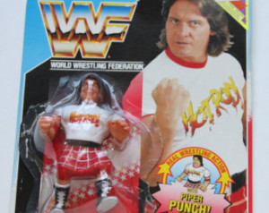 ... WWE HotRod Rowdy Roddy Piper Wrestling Action Figure w/ Piper Punch