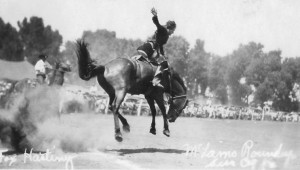 Fox Hastings, famous cowgirl, rides a bucking bronc, McLain Roundup ...
