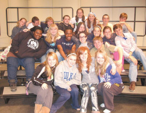 ... to high school poses for a picture the play will be performed friday