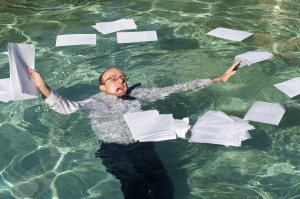 ... COMMITMENT: A LEADER’S ACHILLES HEEL! » drowning in paperwork