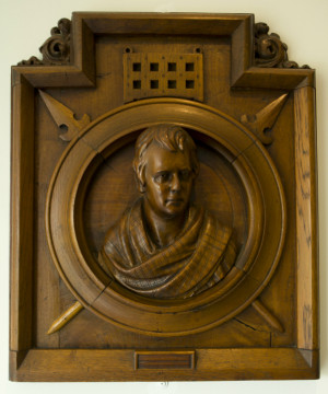 wooden carving of Sir Walter Scott from the Visitor Centre at