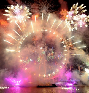 Welcome 2012:Fireworks over the London Eye, in central London, as part ...