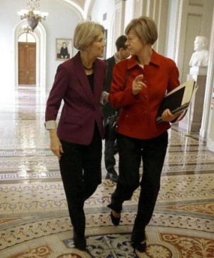... Representative Tammy Baldwin, D-Wis. walked together Capitol Hill