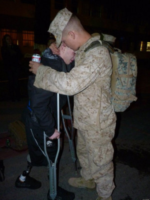 MARINE-WALKS-TO-GIVE-HUG-facebook.jpg