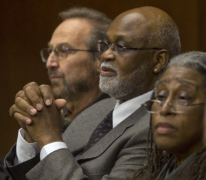 Bridgeforth with attorney Paul Harris (L) and wife Diane (R)