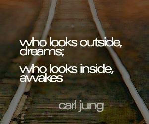 carl jung quote who looks outside dreams who looks inside awakes