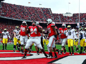 Ohio State running back Carlos Hyde, middle, celebrates after scoring ...
