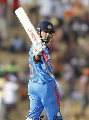 gautam gambhir india s gautam gambhir raises his bat after scoring a ...