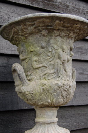 lead 'Charlton' vase with handles and side relief of greek scene.