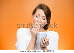 Portrait very tired falling asleep woman yawing employee holding cup ...