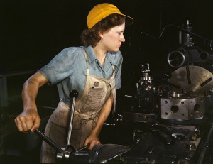 woman making parts for transport planes at the Consolidated Aircraft ...