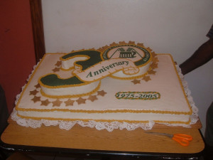 two sheet cakes covered in sugerpaste. The #3 was carved out and a 12 ...