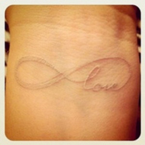 update your look, this Wonderful White Ink Love Quote Tattoo On Wrist ...