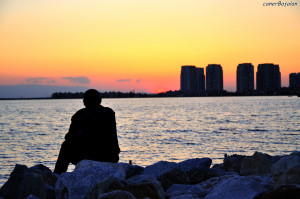 lonely guy watching sundown by svennG