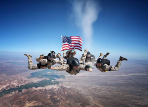 Marines skydiving and spreading the ashes of a fellow fallen Marine in ...