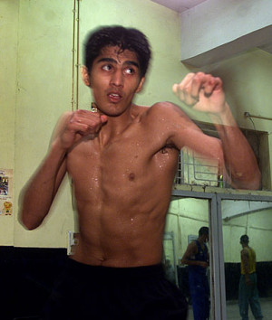 Indian boxer Vijender Singh, who is competing in the mens 64 Kg ...