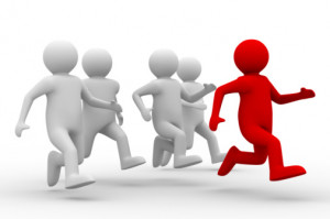 Red Cartoon Guy Running in Front of White Cartoon Guys Repesents ...