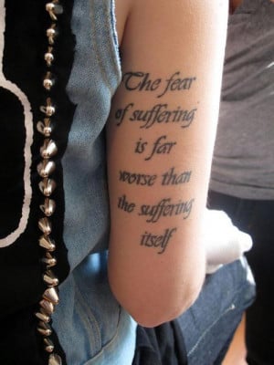 Home » Arm Tattoos » Quotes tattoo » The fear of suffering is far ...