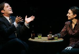 Zak Orth as Lowell and Anneie Parisse as Sara in The Internationalist ...