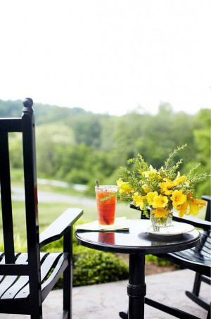 Rocking chairs,porch,sweet ice tea,sunshine yellow flowers,life,peace ...